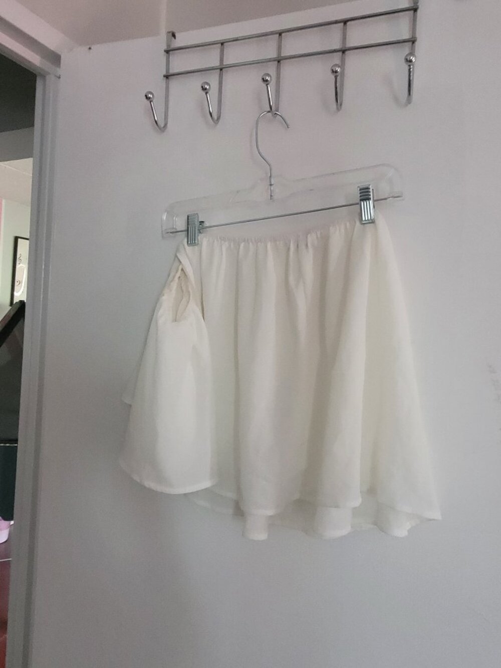 White open shoulder ruffled white sleeves